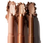 <strong class=aaaaa>Shimmering Golds</strong><br/><span class=bbbbb>Shadow Stix Trios</span><br/><b class=ccccc>Creamy Eyeshadow Stick</b>